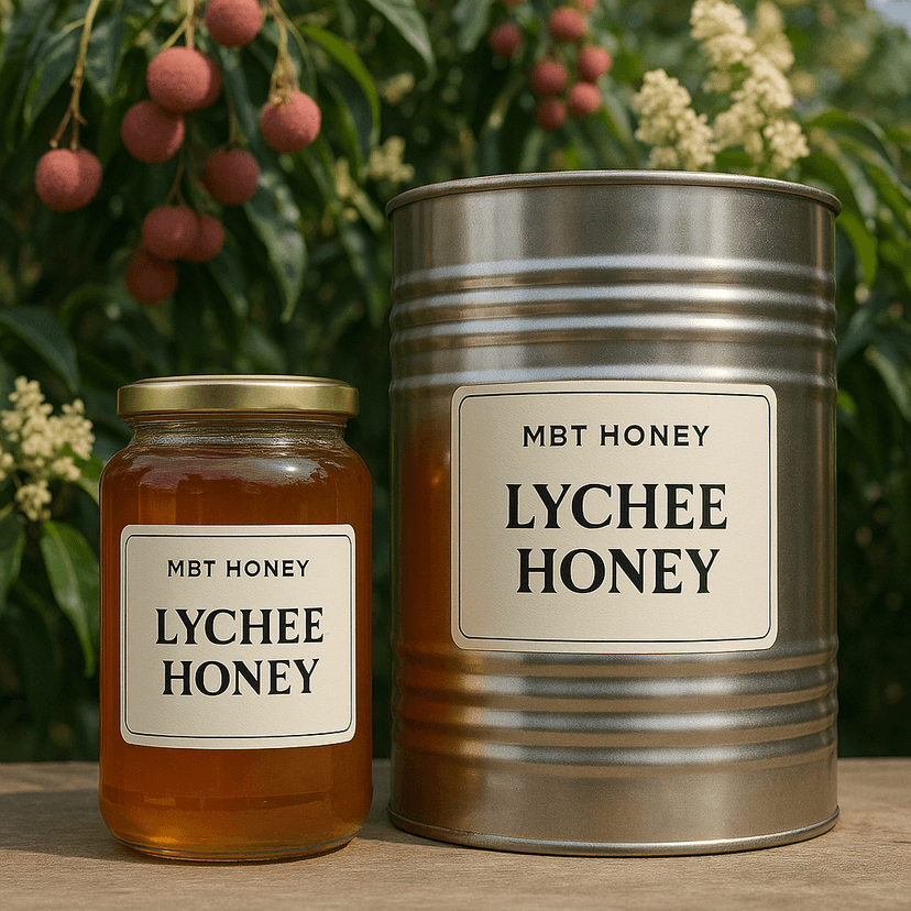 Lychee honey jar on wooden table surrounded by lychee fruits.